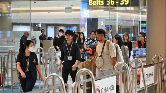 Mencegah Penyebaran Mpox: Bandara Changi Singapura Tingkatkan Pengawasan dengan Alat Pengukur Suhu Mencegah Penyebaran Mpox: Bandara Changi Singapura Tingkatkan Pengawasan dengan Alat Pengukur Suhu